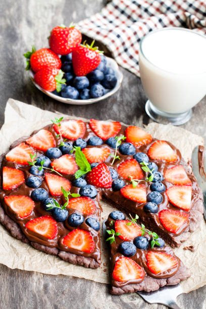 istock Homemade  chocolate natural fruit pizza with berries 855557384