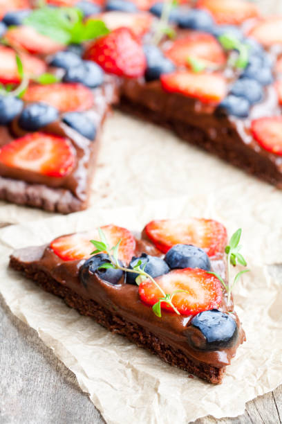 istock Homemade  chocolate natural fruit pizza with berries 855560552