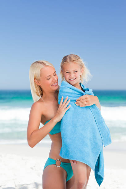 istock Mother with her daughter in her towel 855561054