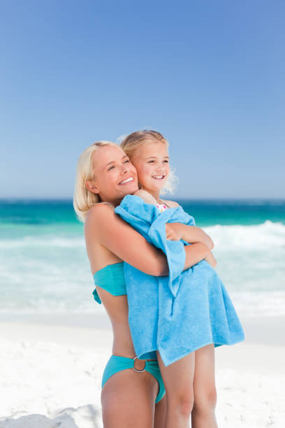 istock Mother with her daughter in her towel 855561126