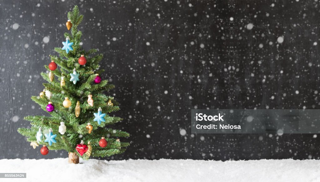 Colorful Christmas Tree, Snow, Copy Space, Snowflakes Colorful Christmas Tree On Snow And Snowflakes. Black Background With Copy Space For Advertisement Christmas Tree Stock Photo