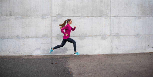 istock Woman sprinting in the city 855563678