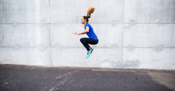 istock Woman jumping high 855563730