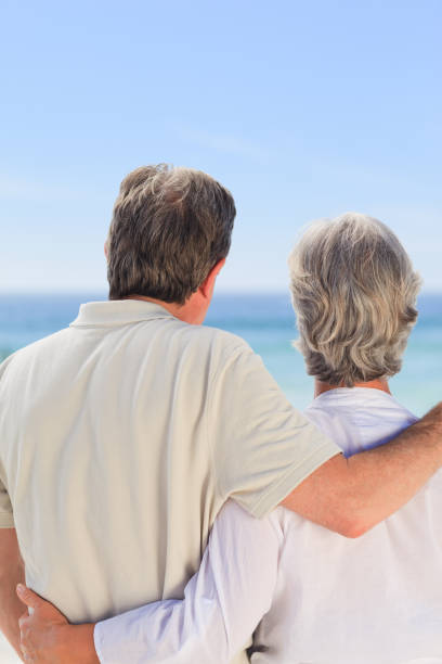 istock Senior couple looking at the sea 855570964