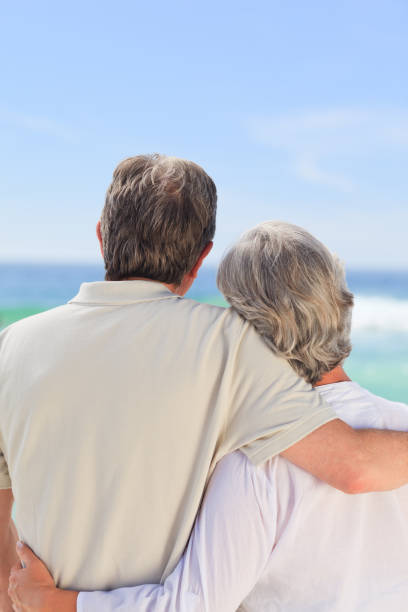 istock Senior couple looking at the sea 855570968