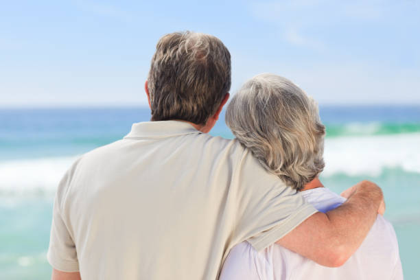 istock Senior couple looking at the sea 855570974
