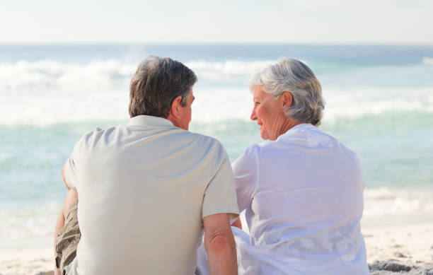 istock Senior couple looking at the sea 855578252
