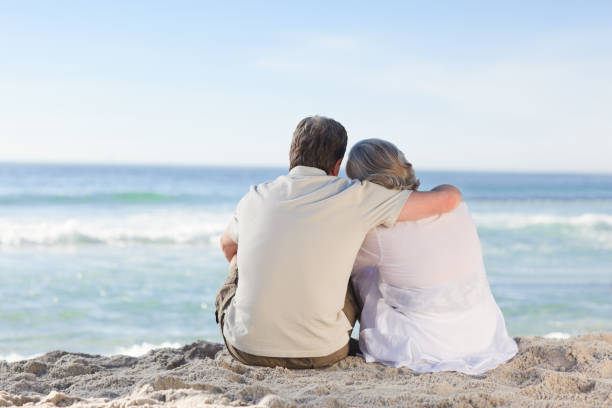 istock Senior couple looking at the sea 855578288