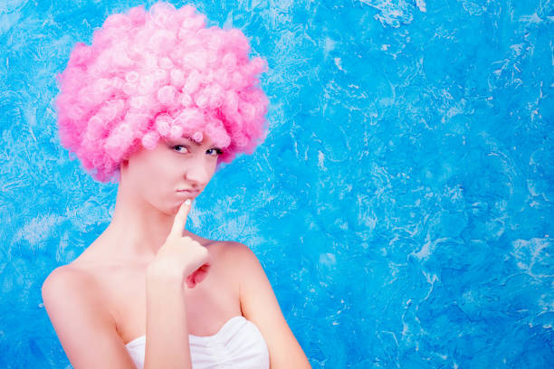 istock Comic girl with pink wig 855578504