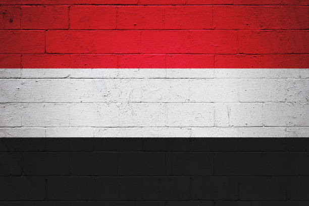istock Flag of Yemen painted on a wall 855581884