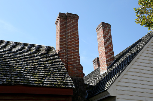 Two brick chimney ready for the first winter fire