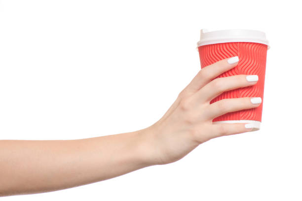istock Cup of cardboard coffee female hands isolated 855588216
