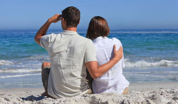 istock Lovely couple at the beach 855591080