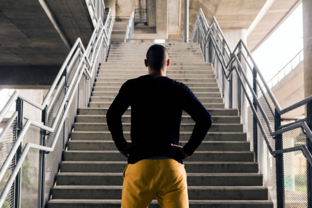 istock Young sport man preparing for a challenge in urban environment. 855594452