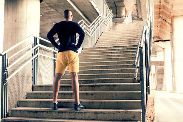 istock Young sport man preparing for a challenge in urban environment. 855594852