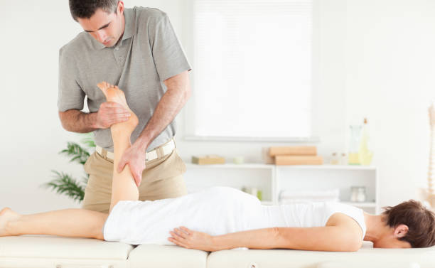istock A female customers leg being massaged 855603206
