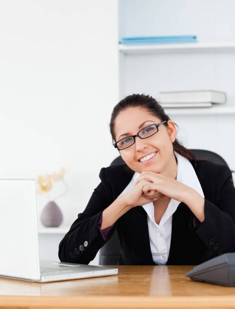istock Young businesswoman smiling to camera 855604902