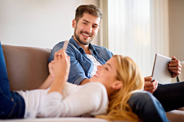 istock Young couple at home 855617696