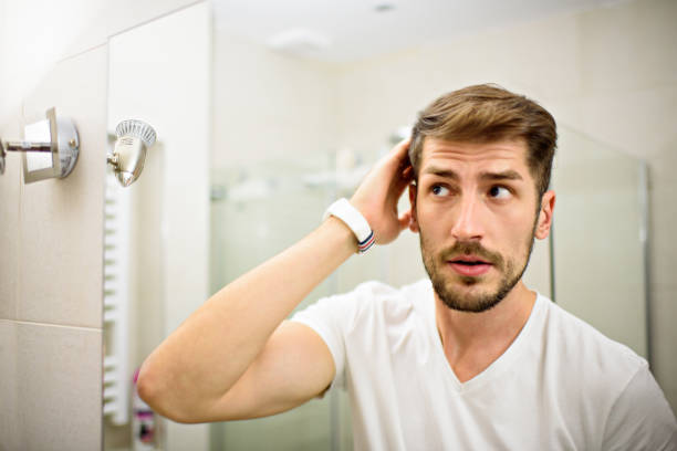 istock Man in the bathroom 855618288