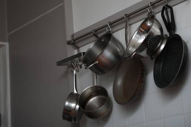 istock Cooking pots hanging in the kitchen 855621032