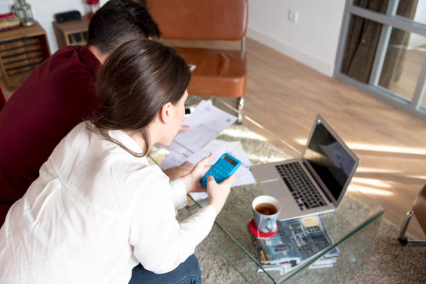 istock young married couple with finance problems and emotional stress 855621338