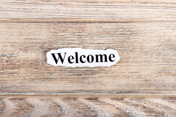 istock WELCOME text on paper. Word WELCOME on torn paper. Concept Image 855621834