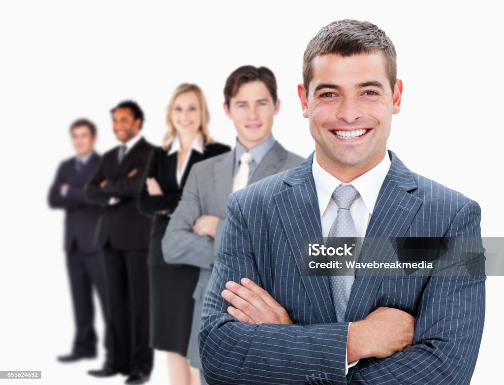 Businesspeople standing in a row Businesspeople standing in a row against white background 20-24 Years Stock Photo