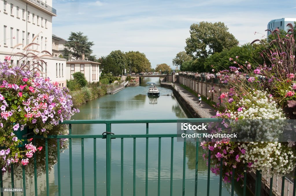 panorama of Mulhouse in Alsace with picturesque channel and flowers Mulhouse Stock Photo