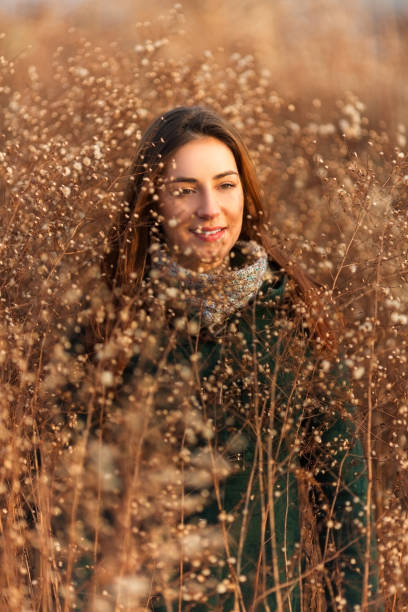istock Young woman in a field 855629236