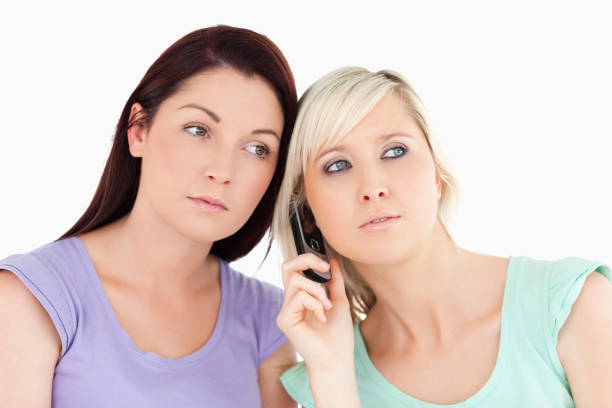 istock Serious women on the phone 855634624