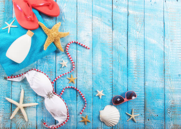 istock Summer beach accessory on the wood table 855637956