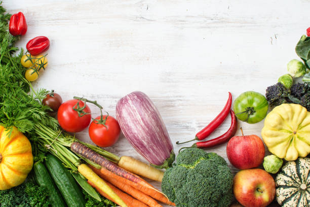istock Top view of rainbow vegetables, fruits, copy space 855638064