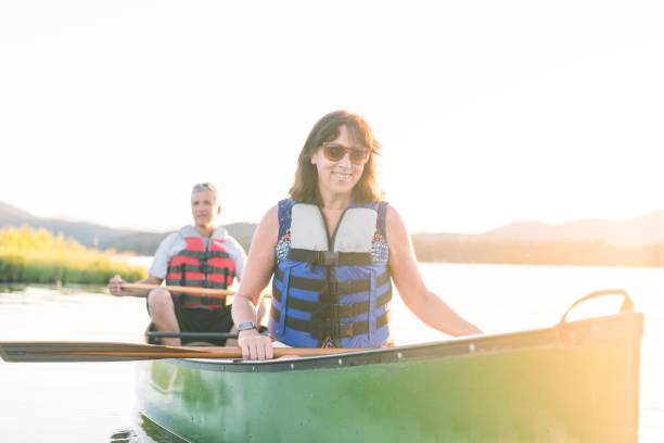 istock Canoeing Together on a Beautiful Lake 855638218