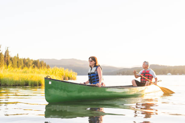 istock Canoeing Together on a Beautiful Lake 855638222