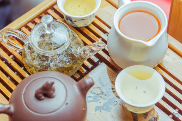 istock Chinese clay teapot with green tea 855638330