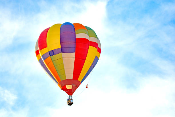 istock Very colorful hot air balloon in calm sky 855644446