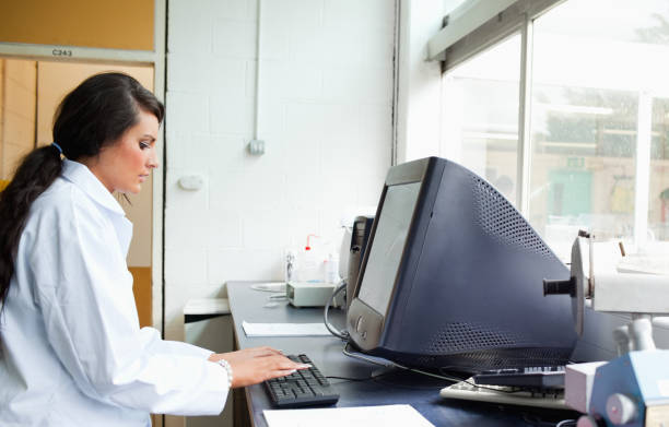 istock Female scientist using a monitor 855645076