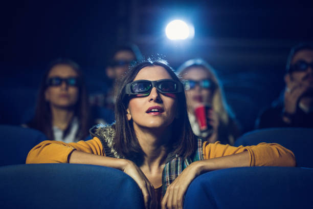 istock Girl in cinema 855657202