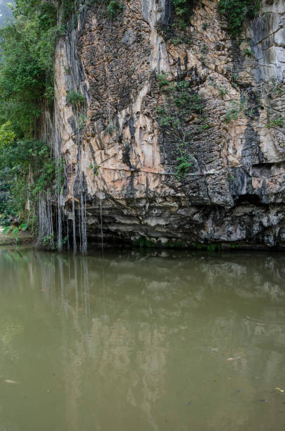 istock Tranquil lake with reflection of limestone mountain 855664214