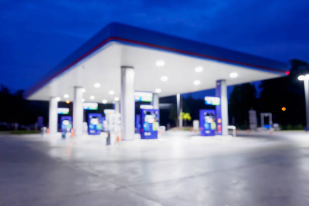 istock Blur Gas station at night time for background 855666964