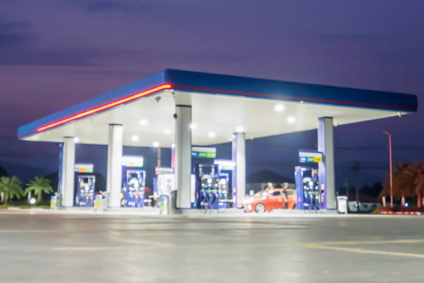 istock blur gas station with clouds and sky at sunset for background 855666966