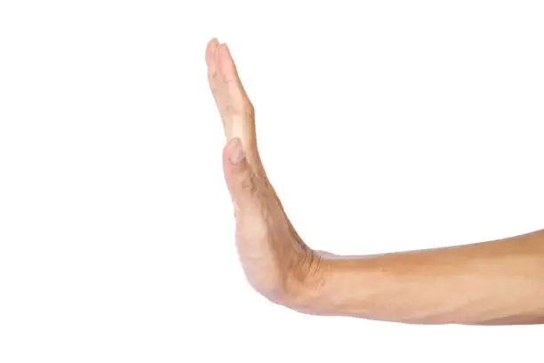 Photo of Man making stop gesture with hand isolated on white background with clipping path.