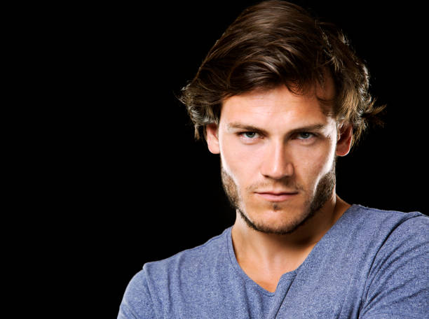 istock caucasian man wearing  black tshirt and trendy hairstyle 855674810