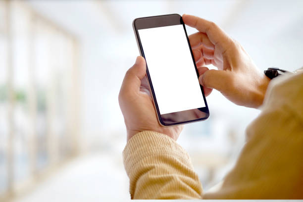 istock Business man hands holding and using mobile phone. 855675142
