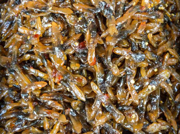 Close-Up Straw Shellfish With Sweet And Spicy Sauce