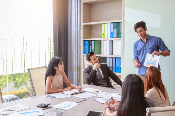 istock Business people discussing documents and ideas at conference meeting room and presentation, Teamwork concept 855695176