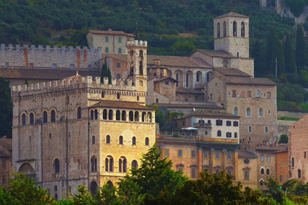 The main building to left is the Palazzo dei Consoli, which has hosted the collections of the Museo Civico (Art Gallery and Museum of Archaeology) since 1909.