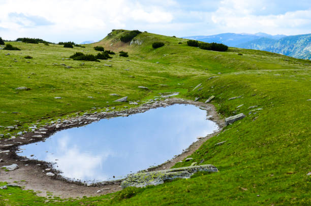 istock Sunny day in the mountains 855706040