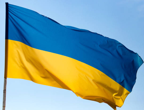 istock flag of Ukraine against the blue sky 855729830