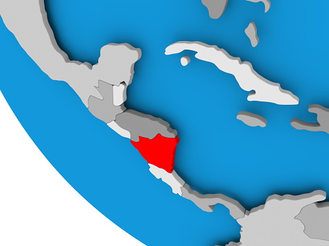 Map of Nicaragua in red on political globe. 3D illustration. 3D model of planet created and rendered in Cheetah3D software, 29 Sep 2017.